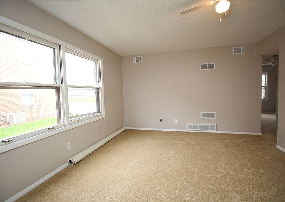 Spacious, bright living room with lovely new floors and heaps of streaming natural light!
