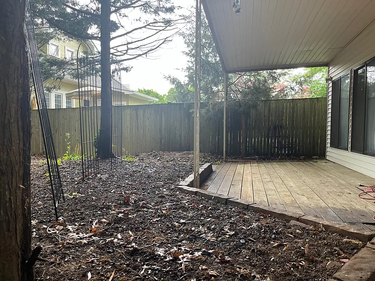 Private patio and little garden area of the Coach House - your own space to plant flowers/bbq/etc