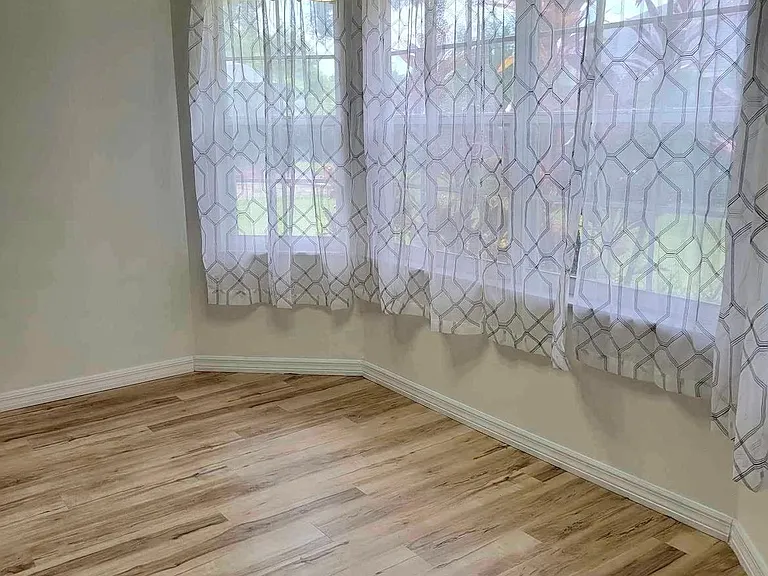 Enjoy nook area overlooking the private backyard