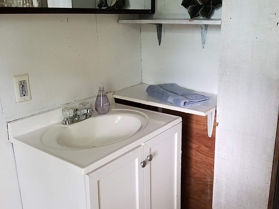 bathroom sink. Shower to the right (not pictured)