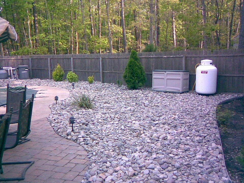 New Pool Heater and River Rock