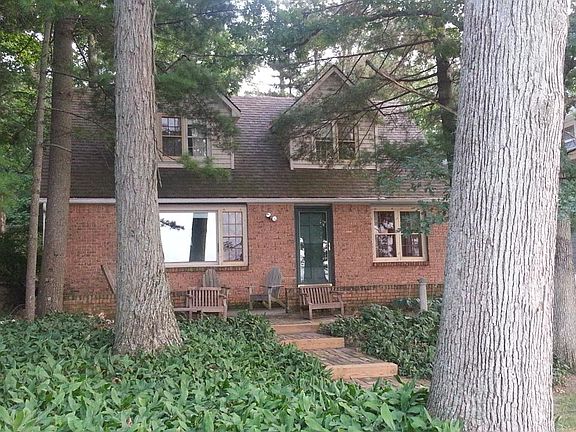 Lakeside view of the house showing patio