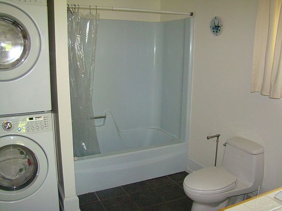 Blue Bathroom with washer & Dryer