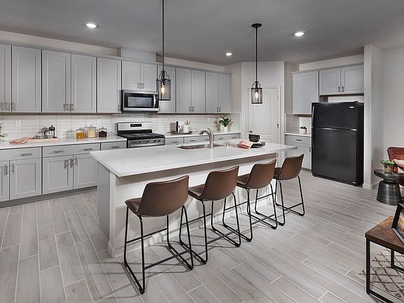 Residence 2 kitchen modeled at a nearby Meritage community.