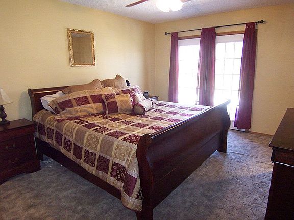 Master bedroom with French Doors that lead out to the new patio.
