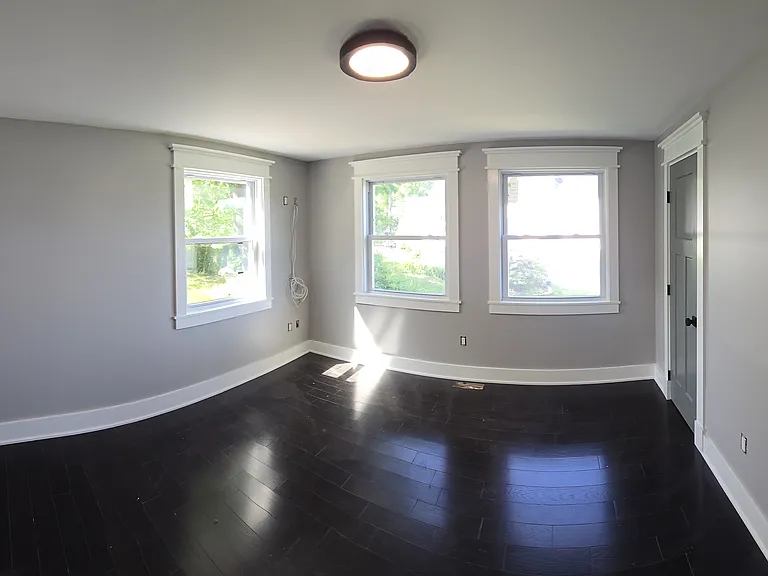Top floor bed with two closest.