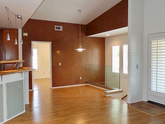 Living room and view of patio door.