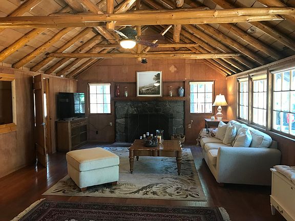 Living room with Wood burning fireplace