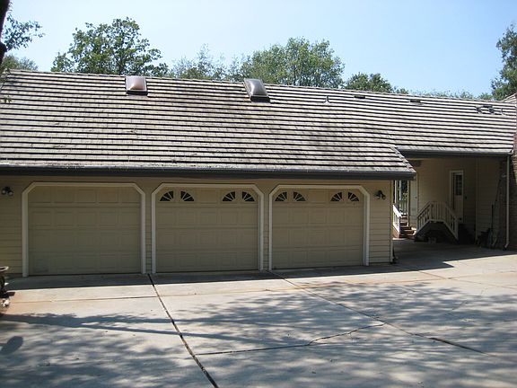 Rear entry 3-car garage