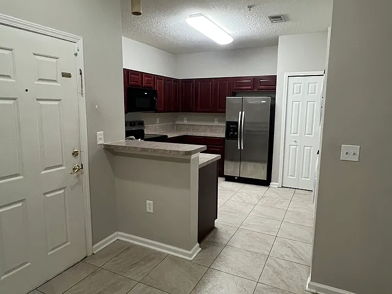 6985 Ortega Woods Dr — Photo 19