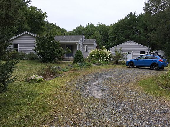Front of house from street- half circle driveway