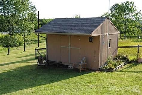 Convenient storage shed for all of your lawn and garden tools