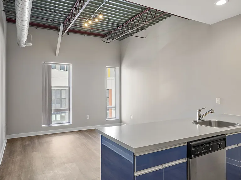 Our Apartment Kitchen & Living Room at Sleek Lofts Apartments in Denver, Colorado