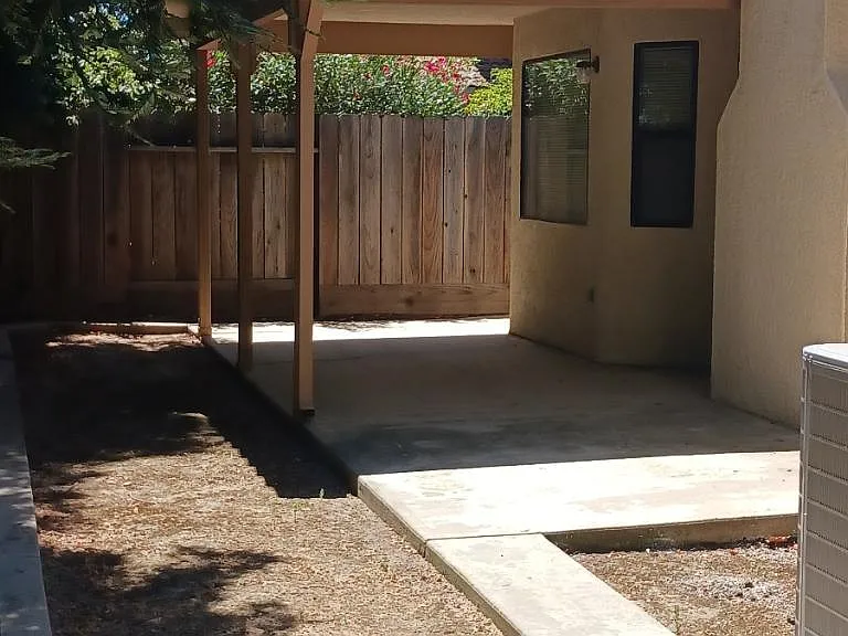 Backyard/covered patio area.