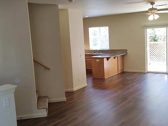 looking to living room and kitchen, and patio door