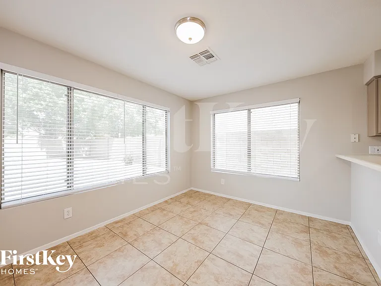 6968 W Aire Libre Ave — Photo 4