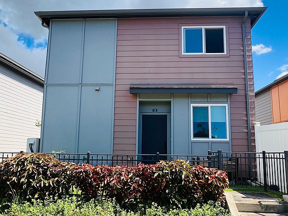 Backyard gate and stairs provide easy access to street parking