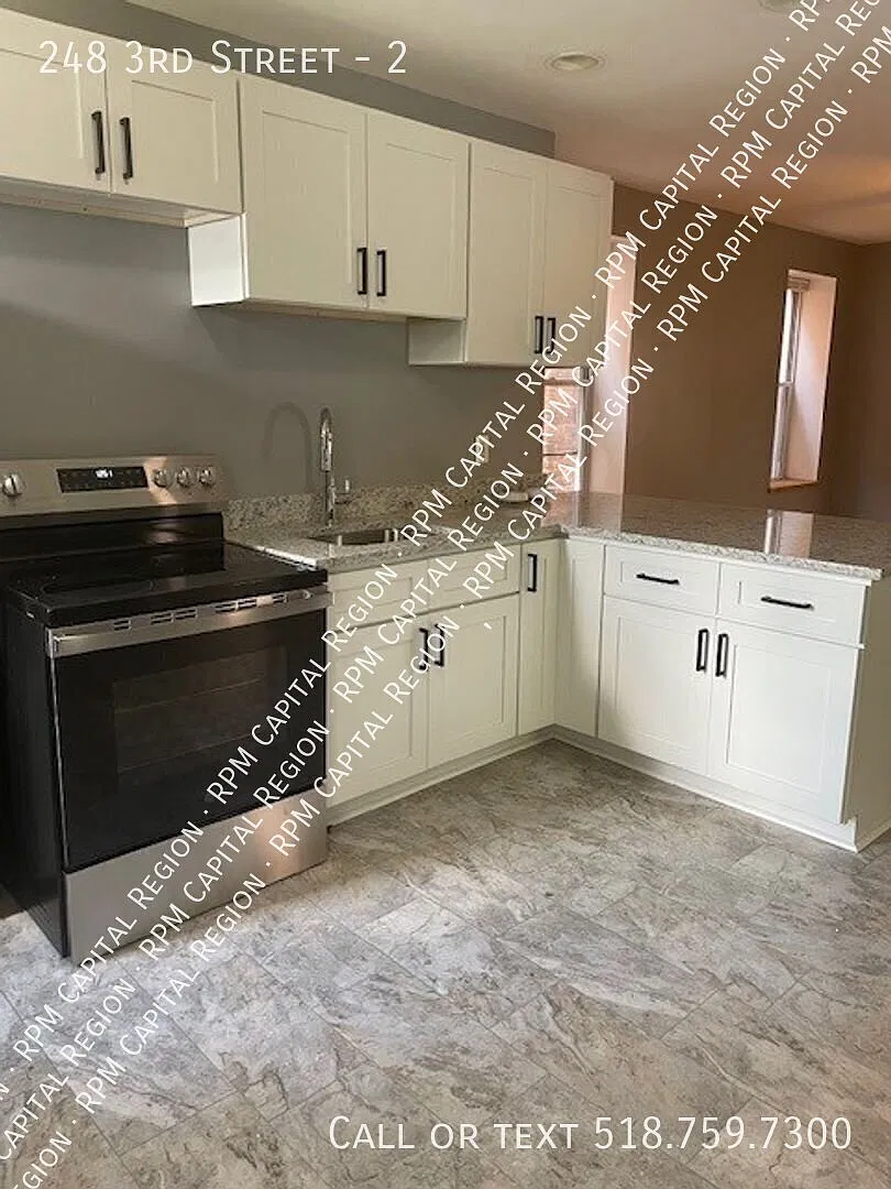 Updated Apartment in Convenient Troy Location — Photo 1