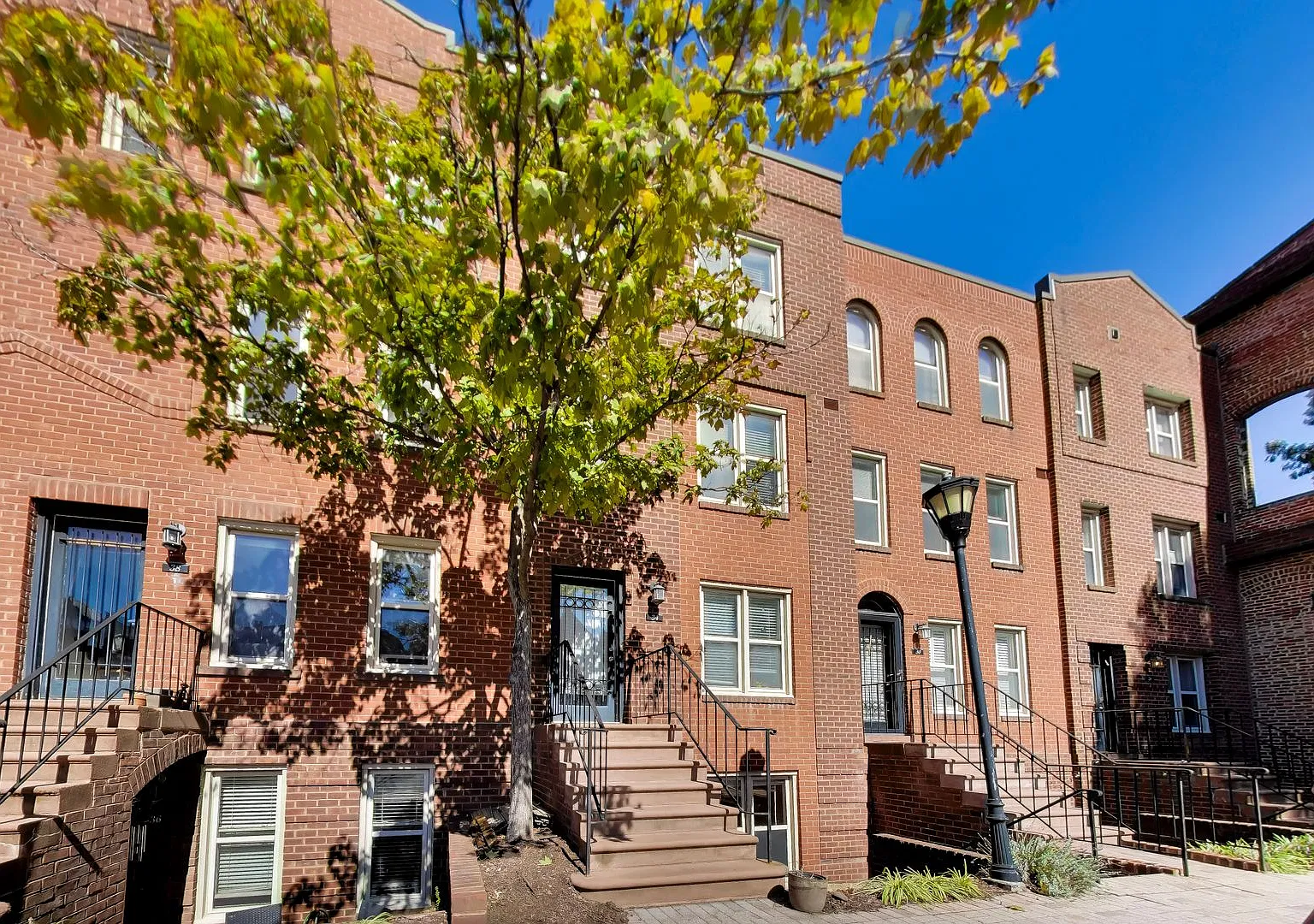Spacious 709 Sq Ft 1BR with Fireplace & In-Unit W/D at The Car Barn $2,250 + Electric — Photo 2
