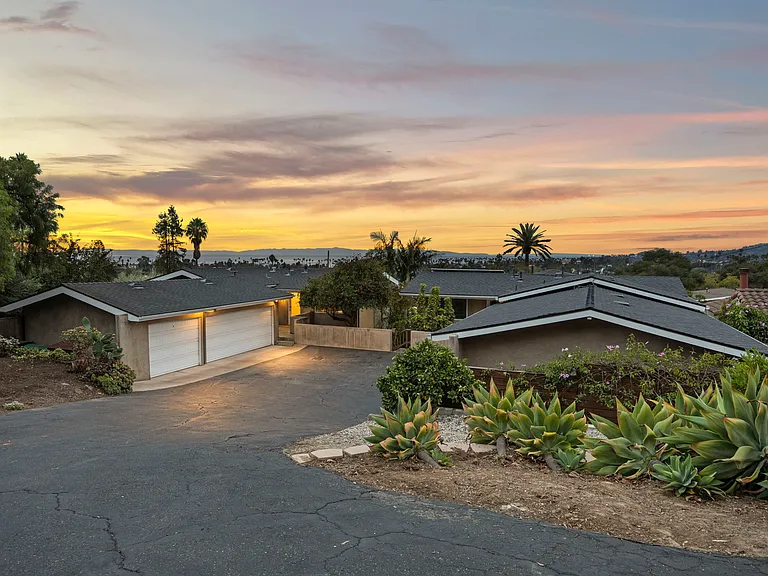 Shared driveway. Our garage and Unit B is on the left as you drive in.