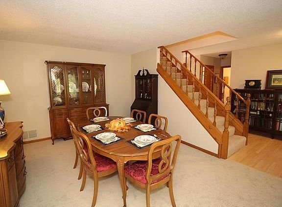 Spacious Dining Room w/ new carpet through out first two floors!