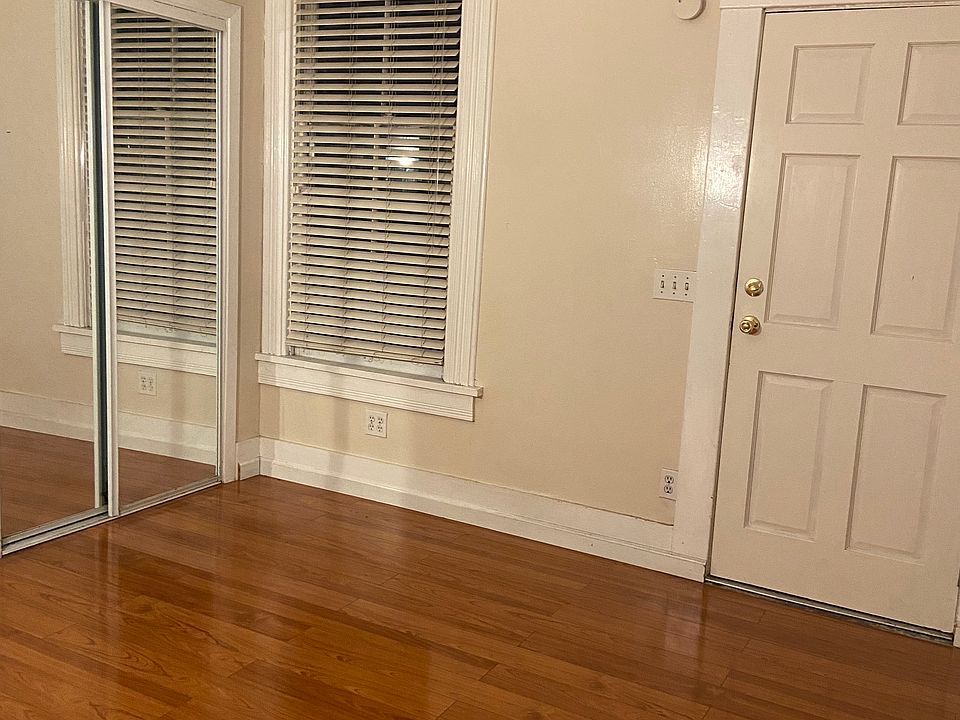 Bedroom with mirrored closet