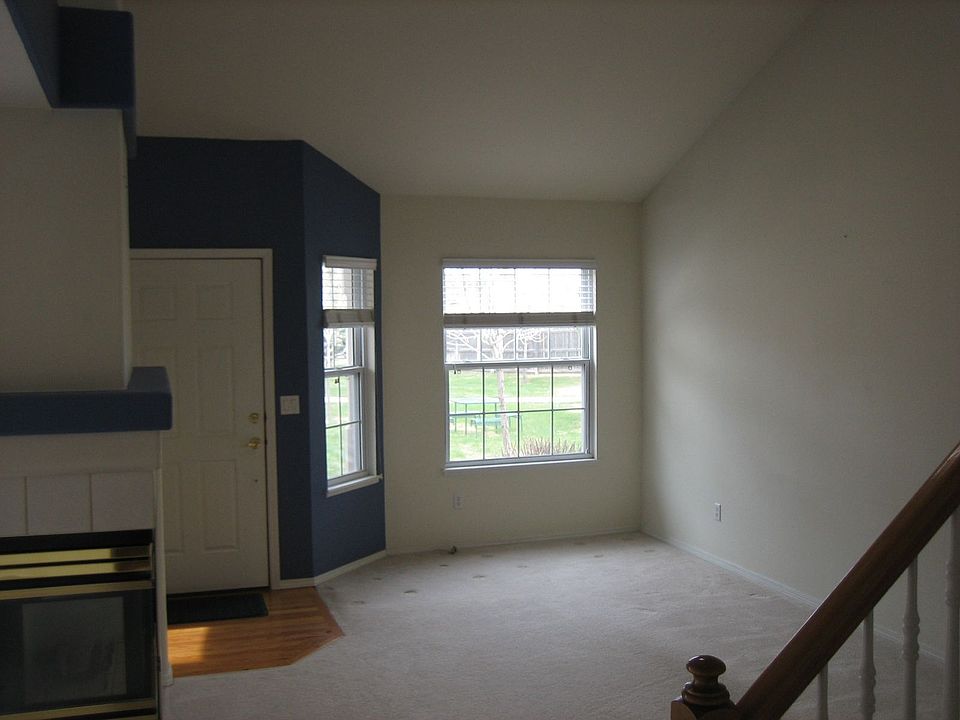 Living Room with Fireplace and skylight
