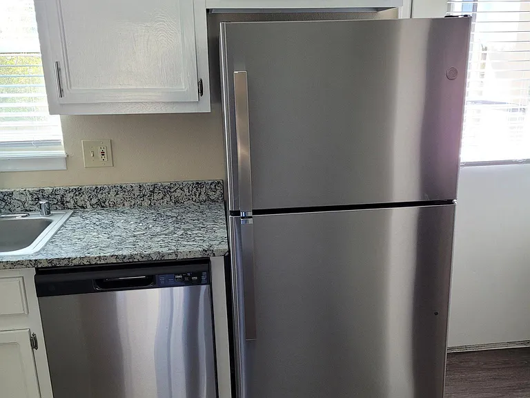New stainless steel dishwasher & refrigerator