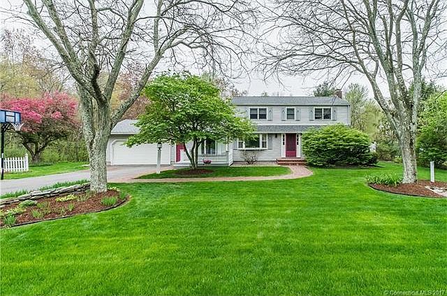 An impeccable yard greets y...
