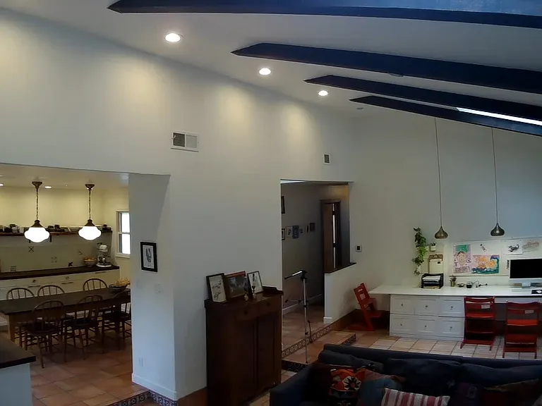 Living room looking into kitchen and dining area