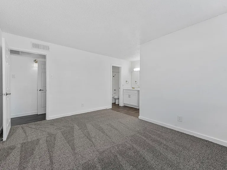 Spacious bedroom or office space with built in storage