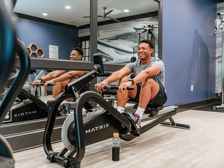 Fitness center with rowing machine