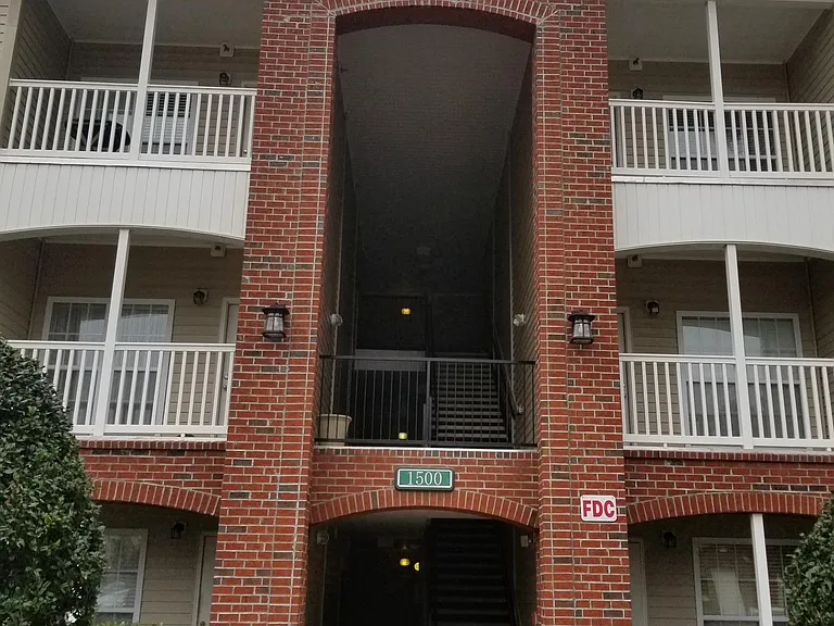 Entrance to the building where condo is located on 2nd floor