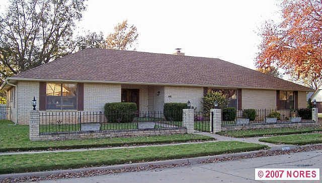 Corner lot with side garage entry.