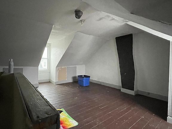 Third floor bonus room could be home office or play area