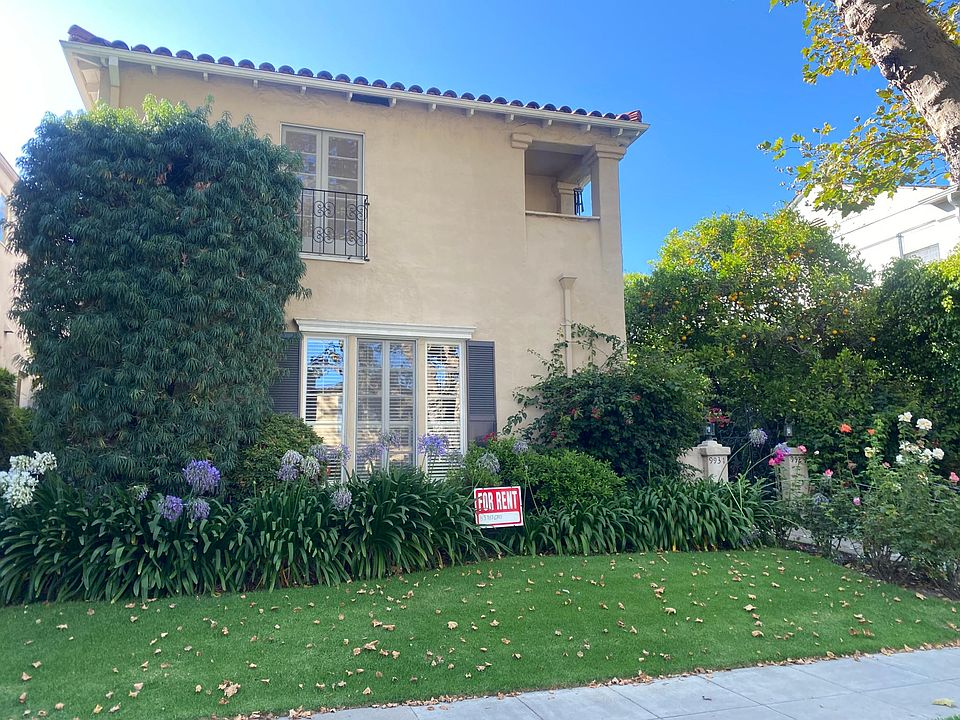 Beautiful 1930s duplex on a tree lined street, one block from BHHS.