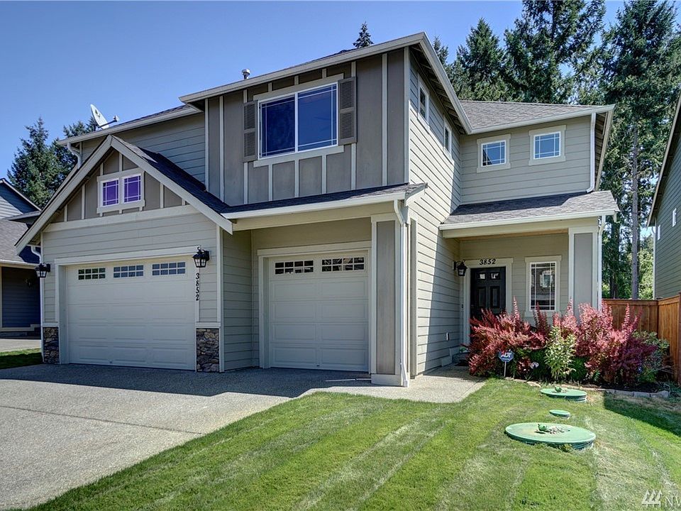 Welcome to this delightful 4 bedroom, 2.5 bath home with a three car garage in the beautiful community of Hicks Lake.