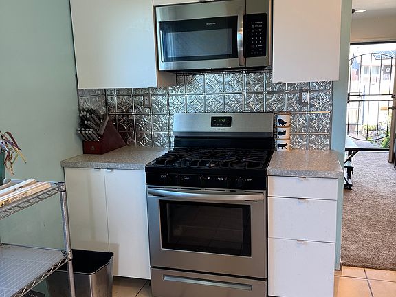 updated kitchen with stainless steel appliances