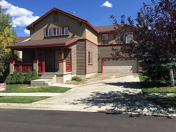Porch and 2 car garage