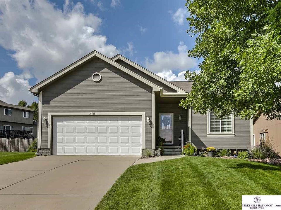 No Lawn mowing, or snow shoveling or exterior painting...low HOA!