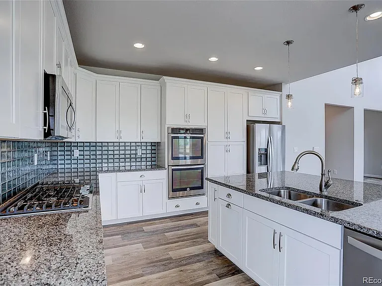 15246 W 93rd Ave — Photo 22