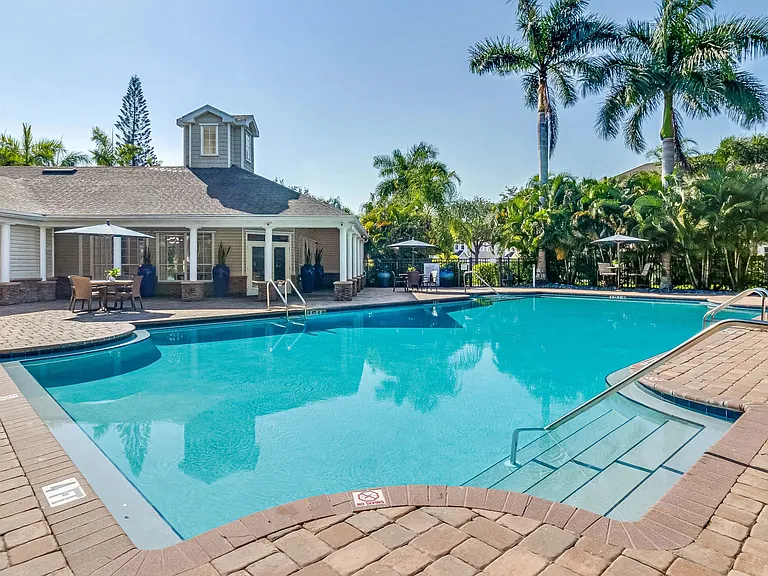 Immerse yourself in endless summer with our resort-style swimming pool - a vacation vibe right at home!