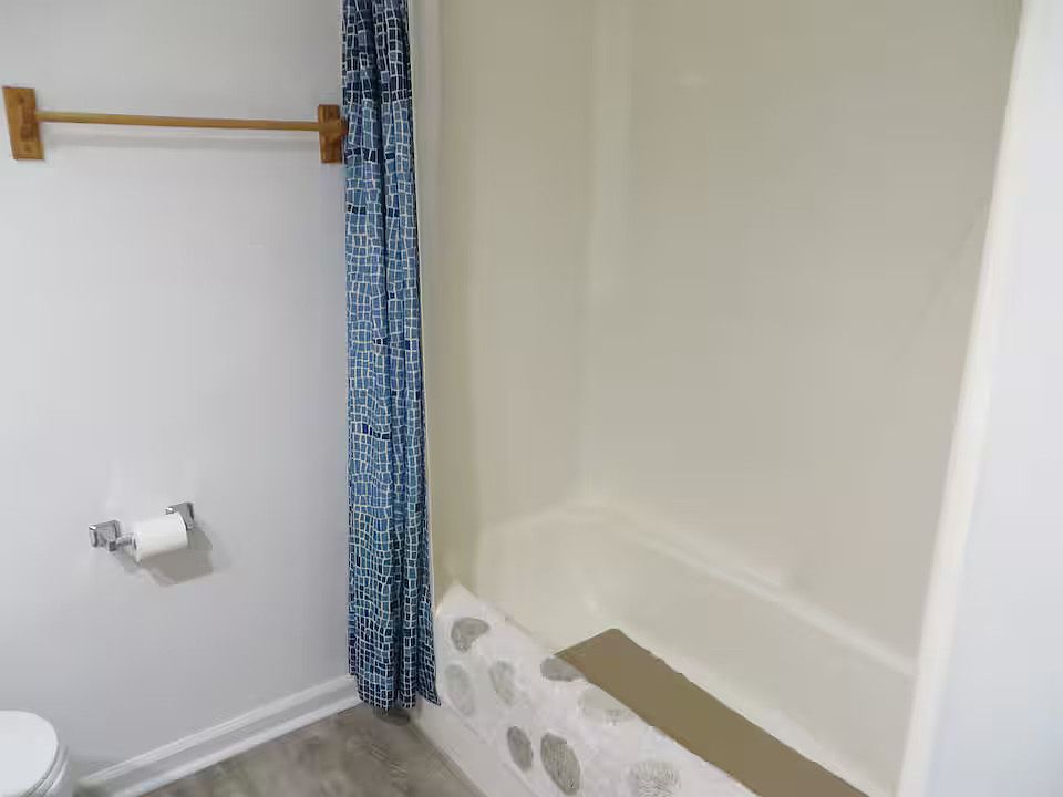 Upstairs full bath. The bathtub.