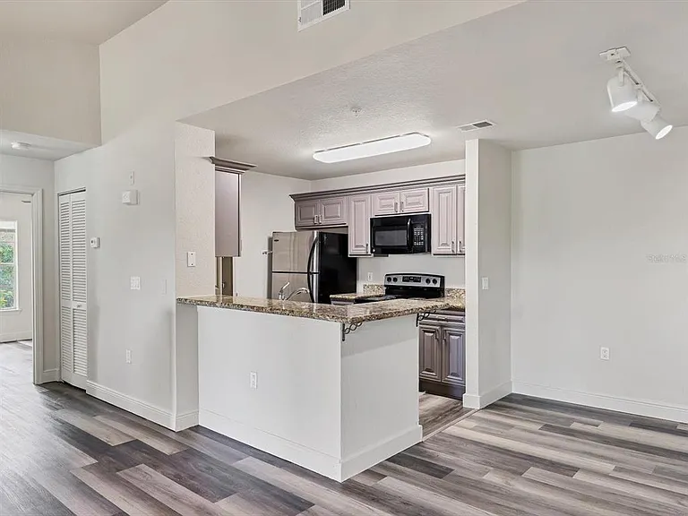 8911 Manor Loop #205 — Photo 11