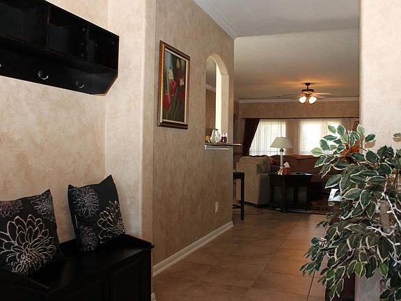 A look into the Den. Notice the curved window/breakfast bar area?