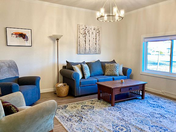 Living Room with picture window and view of mountains