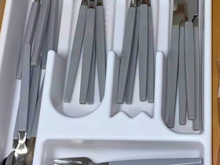 Forks, knives, and spoons provided for your convenience.