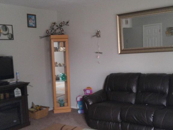 Picture of family room with furniture (not included)