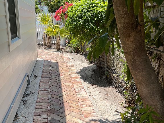 Brick pathway to your cottage.