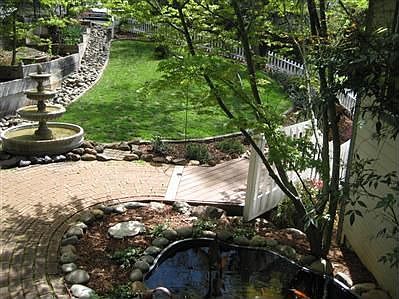 front entrance - fountain and koi pond